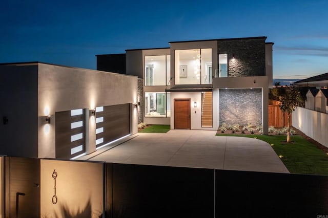 modern home featuring a garage