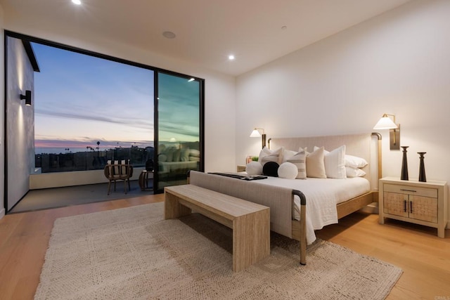 bedroom with light wood-type flooring