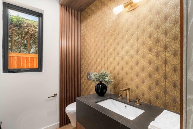 bathroom featuring sink and toilet