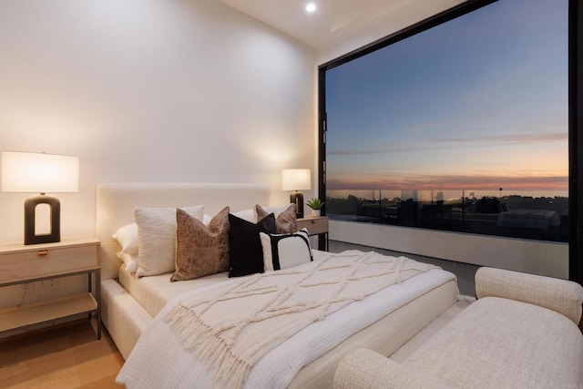 bedroom featuring light hardwood / wood-style flooring