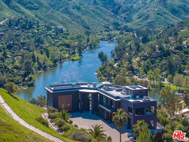 drone / aerial view featuring a water view