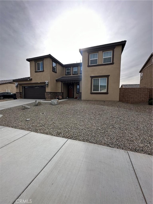 view of front of home with a garage