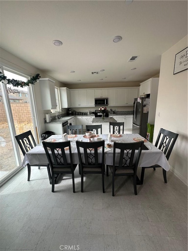 dining room with sink