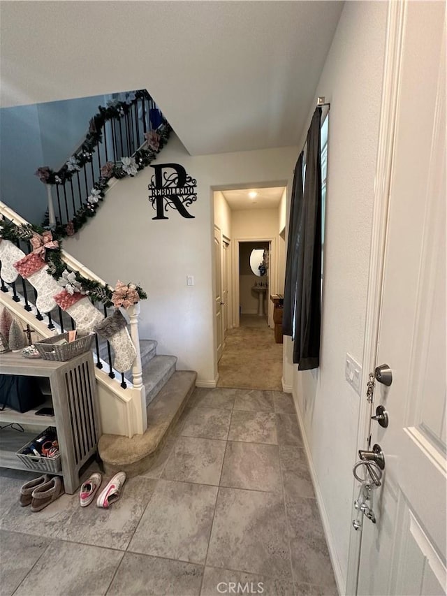 corridor with tile patterned flooring