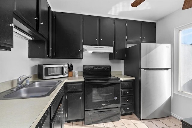 kitchen with light tile patterned floors, stainless steel appliances, ceiling fan, and sink