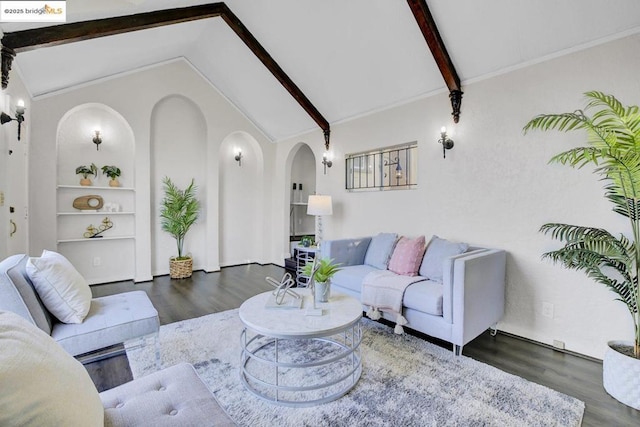 living room with dark wood-type flooring, built in features, and vaulted ceiling with beams