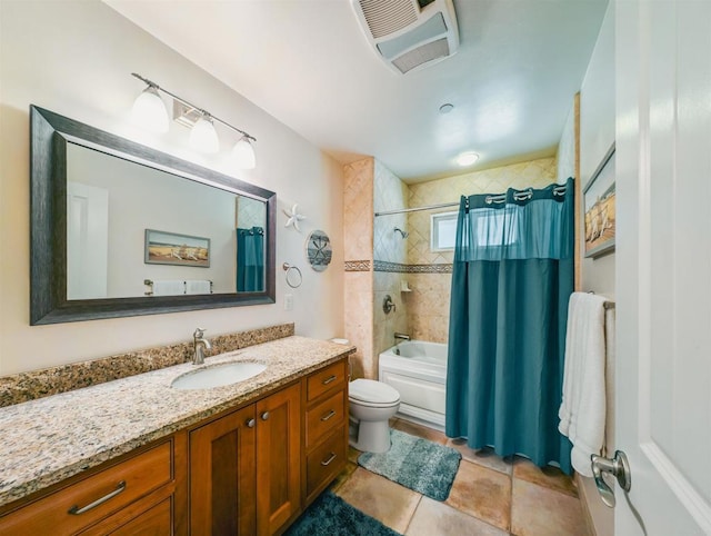 full bathroom featuring vanity, tile patterned floors, shower / bath combination with curtain, and toilet