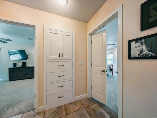 corridor featuring carpet floors