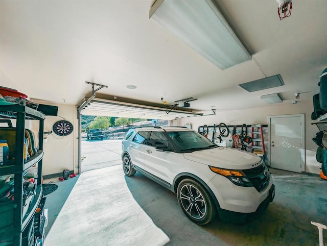 garage featuring a garage door opener