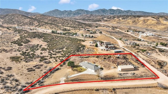 aerial view with view of desert and a mountain view