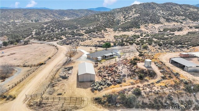 bird's eye view featuring a rural view and a mountain view