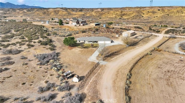 drone / aerial view with a desert view and a mountain view