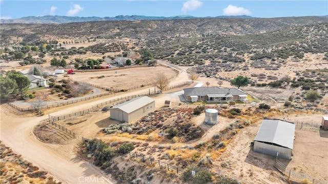 bird's eye view with view of desert, a rural view, and a mountain view