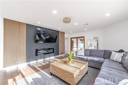 living room with wood-type flooring