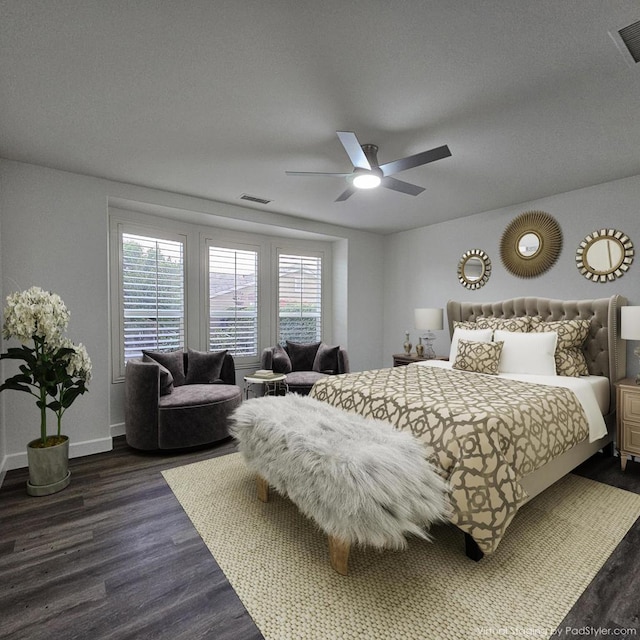 bedroom with ceiling fan and dark hardwood / wood-style flooring