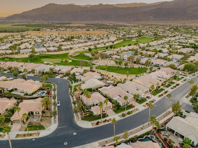 birds eye view of property featuring a mountain view