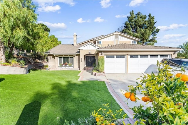 view of front of house with a front lawn and a garage