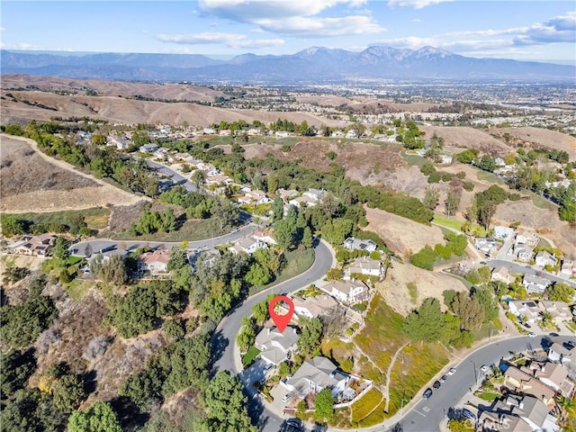 bird's eye view with a mountain view