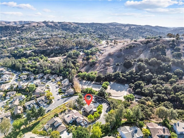 drone / aerial view featuring a mountain view