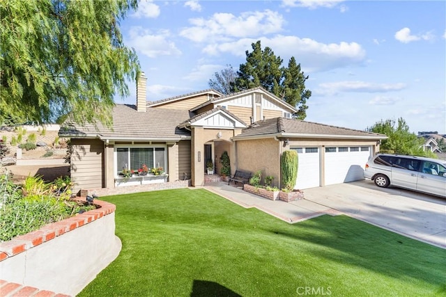 view of front of home featuring a front yard and a garage