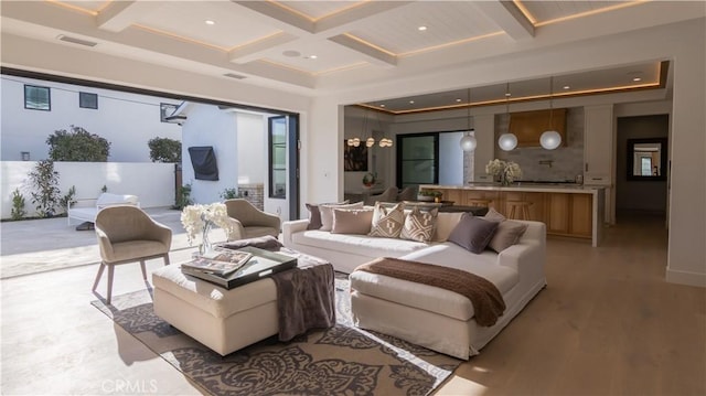 interior space with beamed ceiling and coffered ceiling