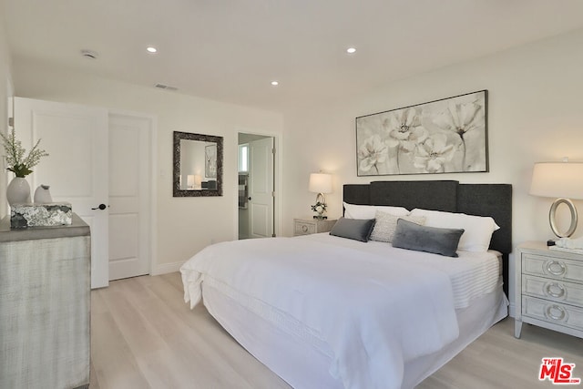 bedroom featuring light hardwood / wood-style flooring