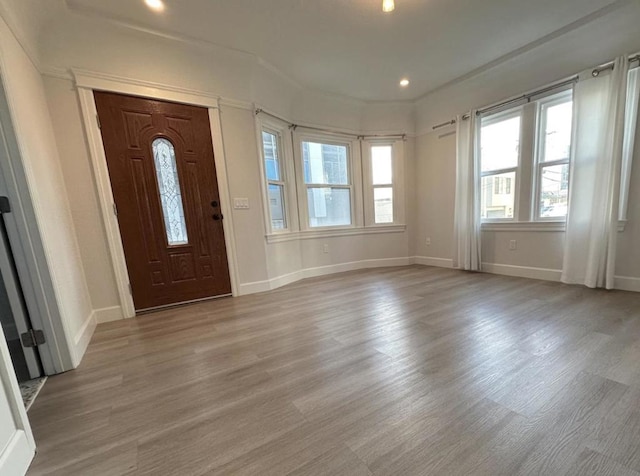 entrance foyer with light wood-type flooring