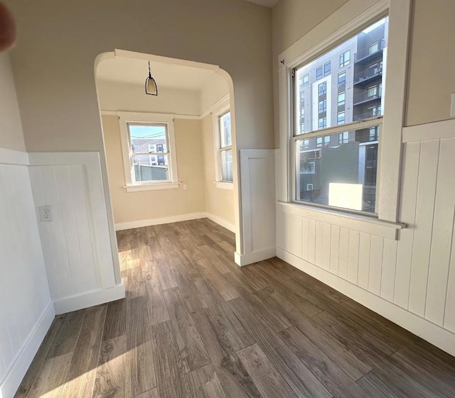 interior space with dark hardwood / wood-style flooring