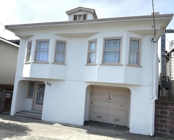 view of front of home with a garage