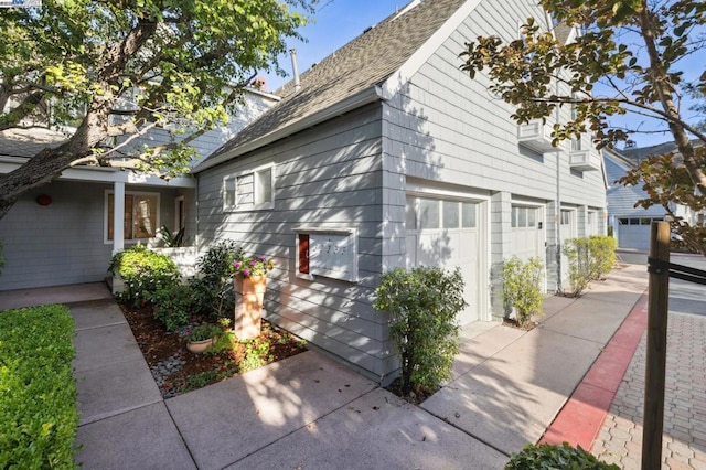 view of home's exterior featuring a garage