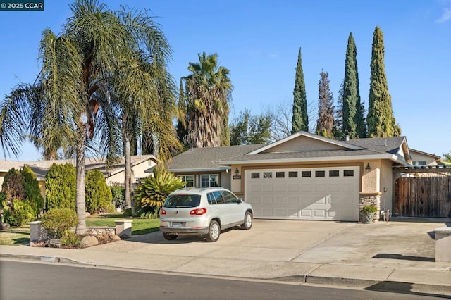 ranch-style home featuring a garage