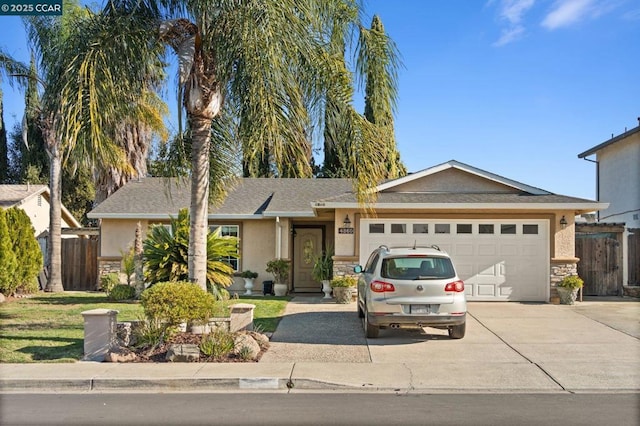 ranch-style house featuring a garage