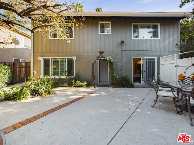 back of house featuring a patio