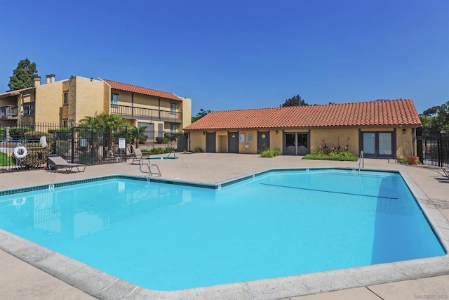 view of pool featuring a patio