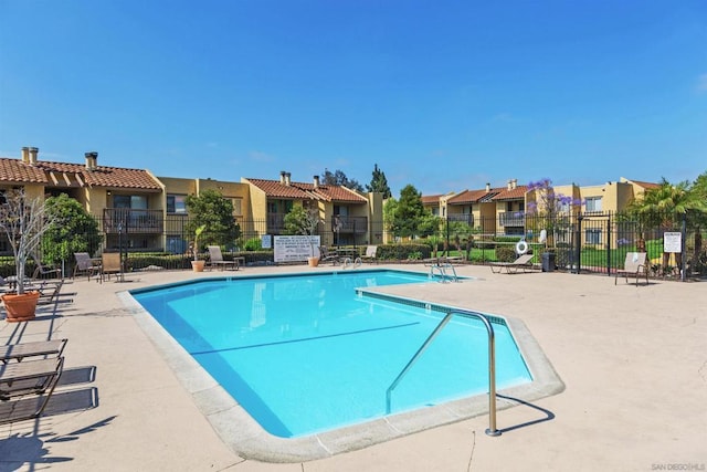 view of swimming pool featuring a patio