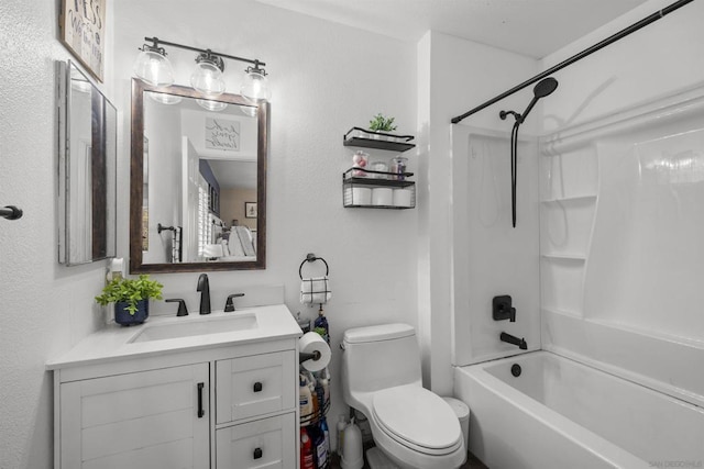 full bathroom with toilet, vanity, and bathtub / shower combination