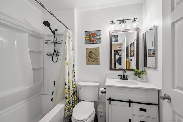 full bathroom with washer / dryer, toilet, vanity, and shower / bath combo