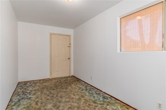 view of carpeted spare room