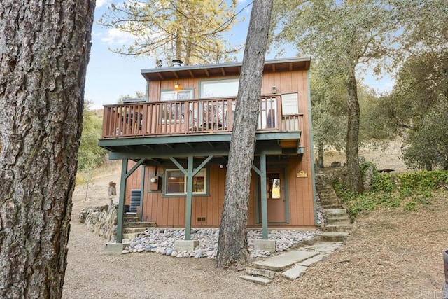 rear view of property with a deck