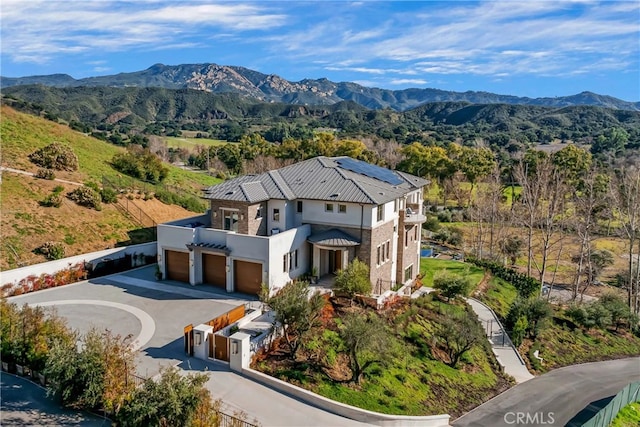 aerial view featuring a mountain view