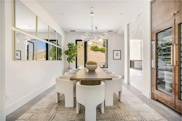 dining area featuring a chandelier