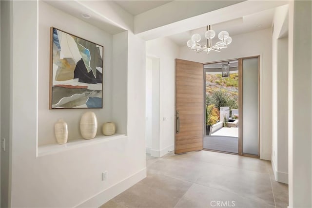 interior space featuring an inviting chandelier