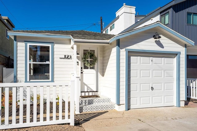 property entrance with a garage