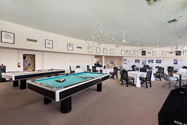 rec room with ceiling fan, carpet, billiards, and a textured ceiling