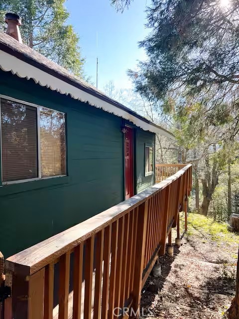 view of side of home featuring a deck