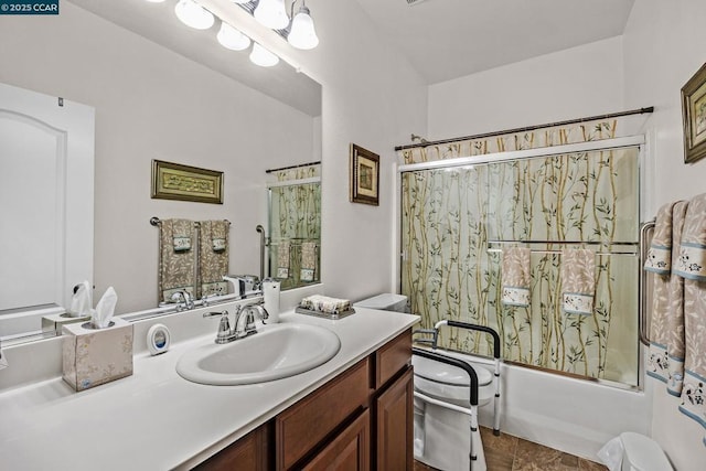 full bathroom featuring toilet, vanity, and bathing tub / shower combination