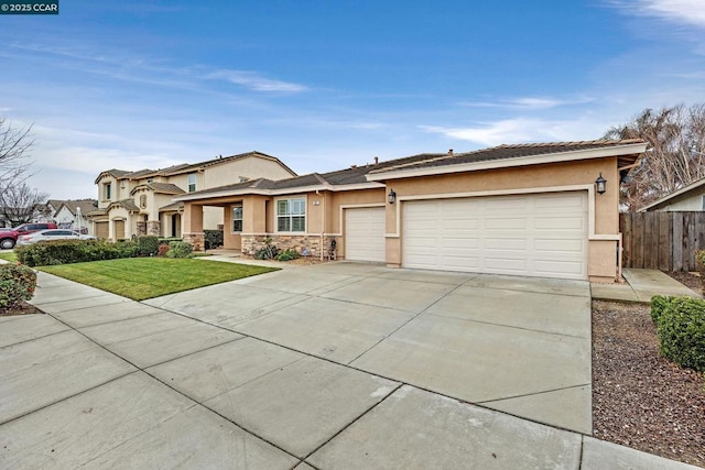 view of front facade featuring a front lawn and a garage