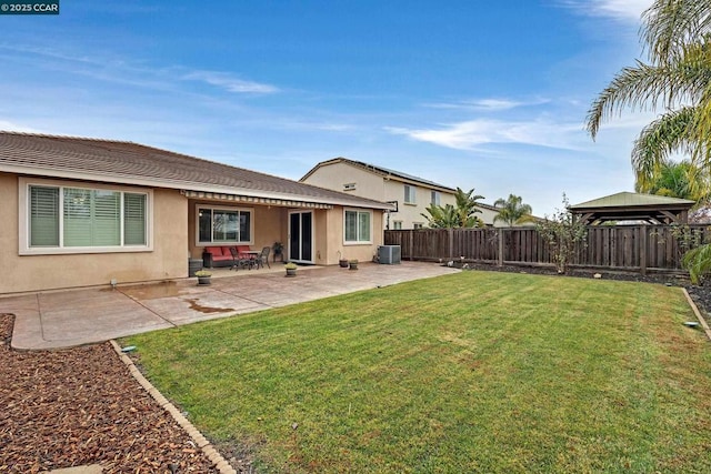 view of yard with a patio area and central AC