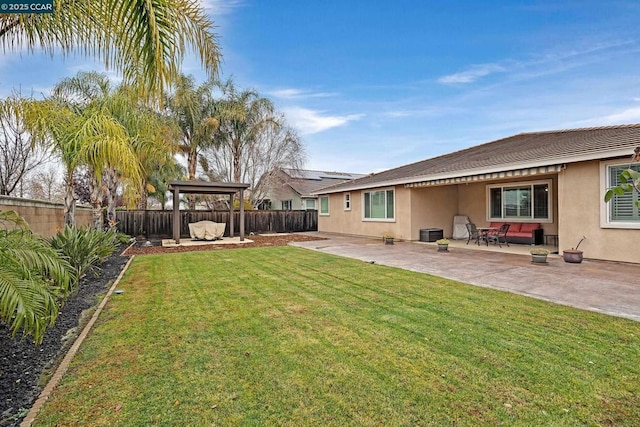 view of yard featuring central AC and a patio