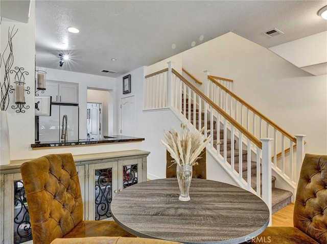 dining area with light hardwood / wood-style flooring